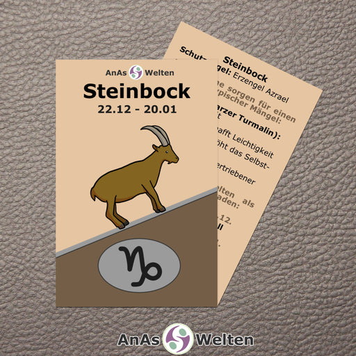 Das Bild zeigt die Sternzeichen Karte Steinbock von AnAs Welten. Die Vorderseite ist mit einer Zeichnung eines Steinbocks, dem Sternzeichensymbol und dem Text „Steinbock 22.12 - 20.01“ versehen. Auf der Rückseite steht ein Infotext zu dem Sternzeichen.